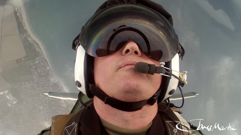 James Martin wearing a helmet and goggles during a flight